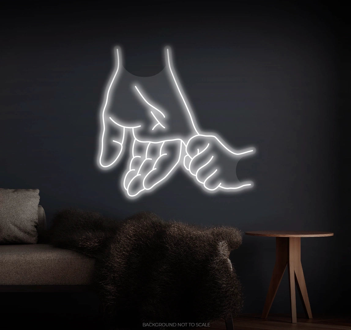 Child holding little finger LED neon