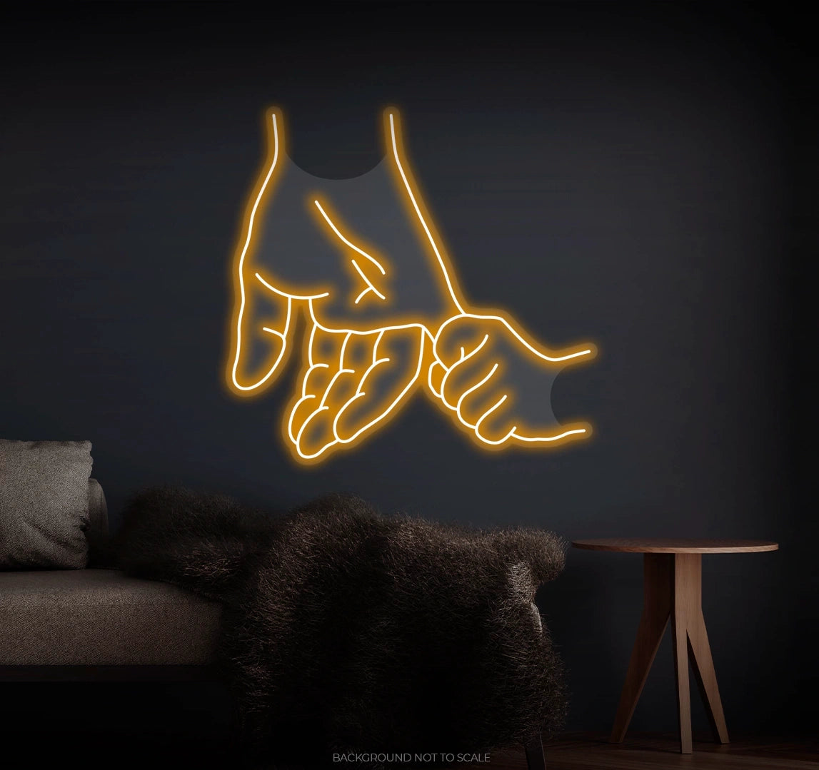 Child holding little finger LED neon