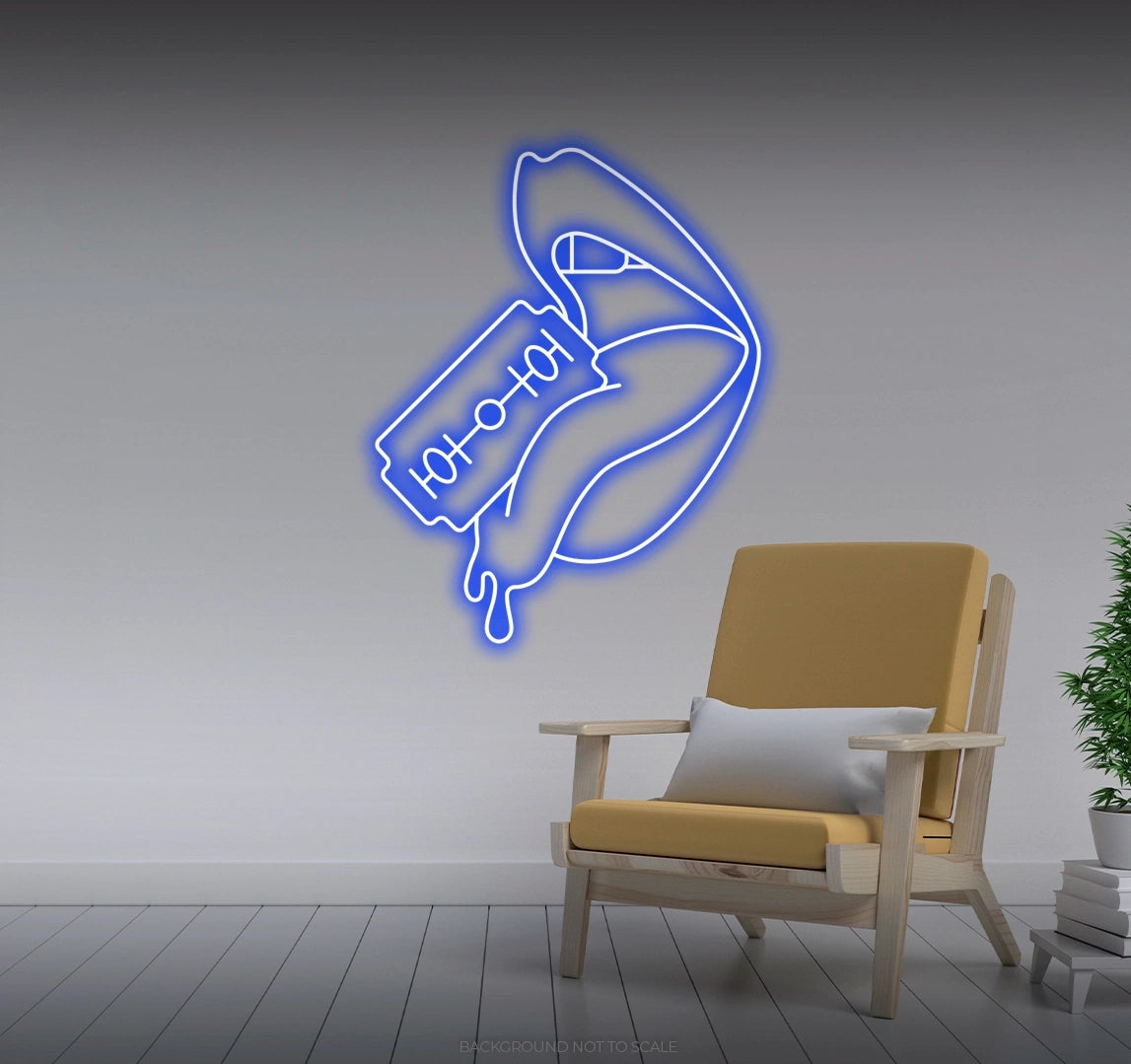 Razor blade cutting woman's tongue Ledneon