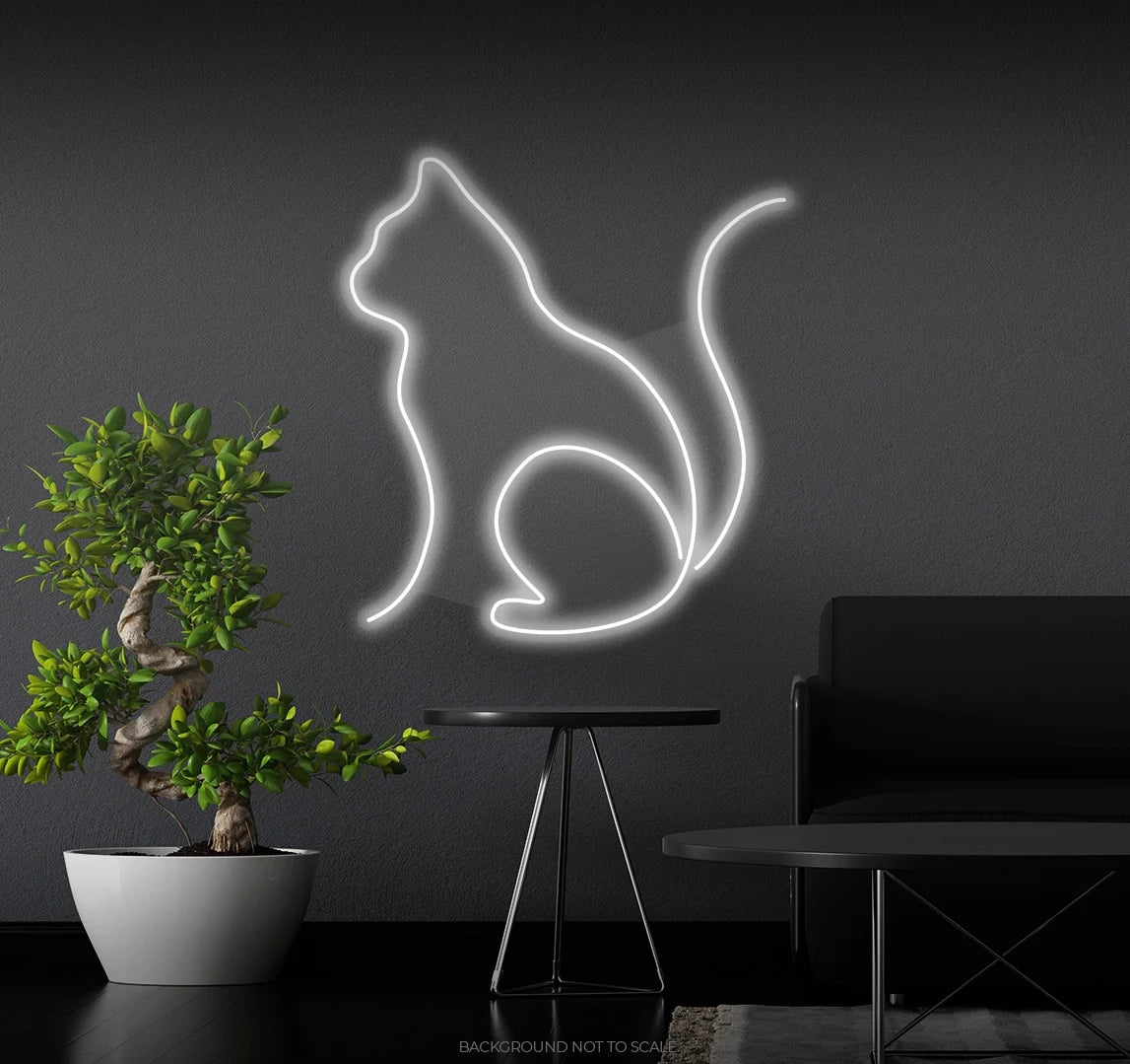 Cat is sitting ledneon